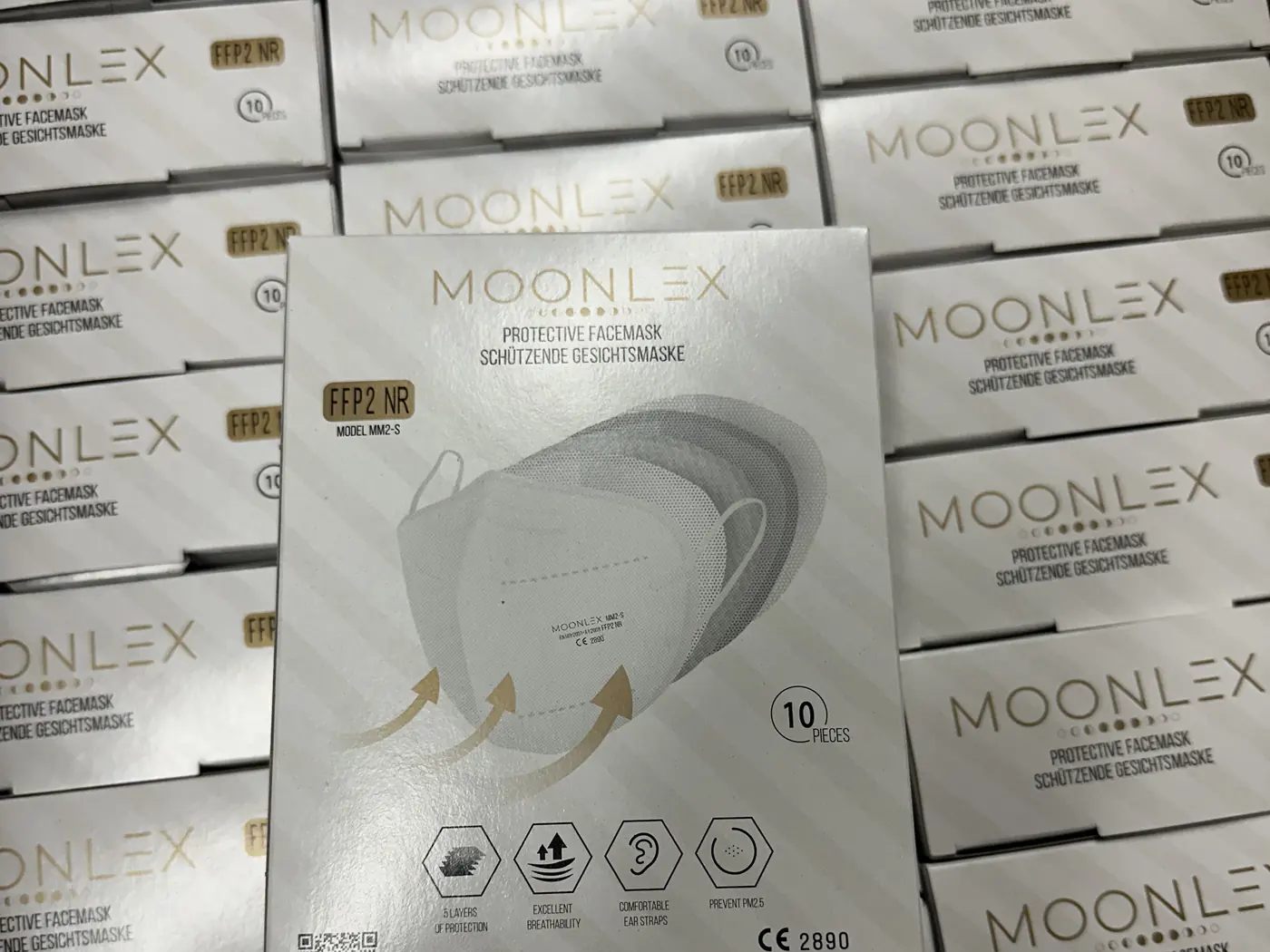 MOONLEX retail boxes stacked through the finished-goods warehouse